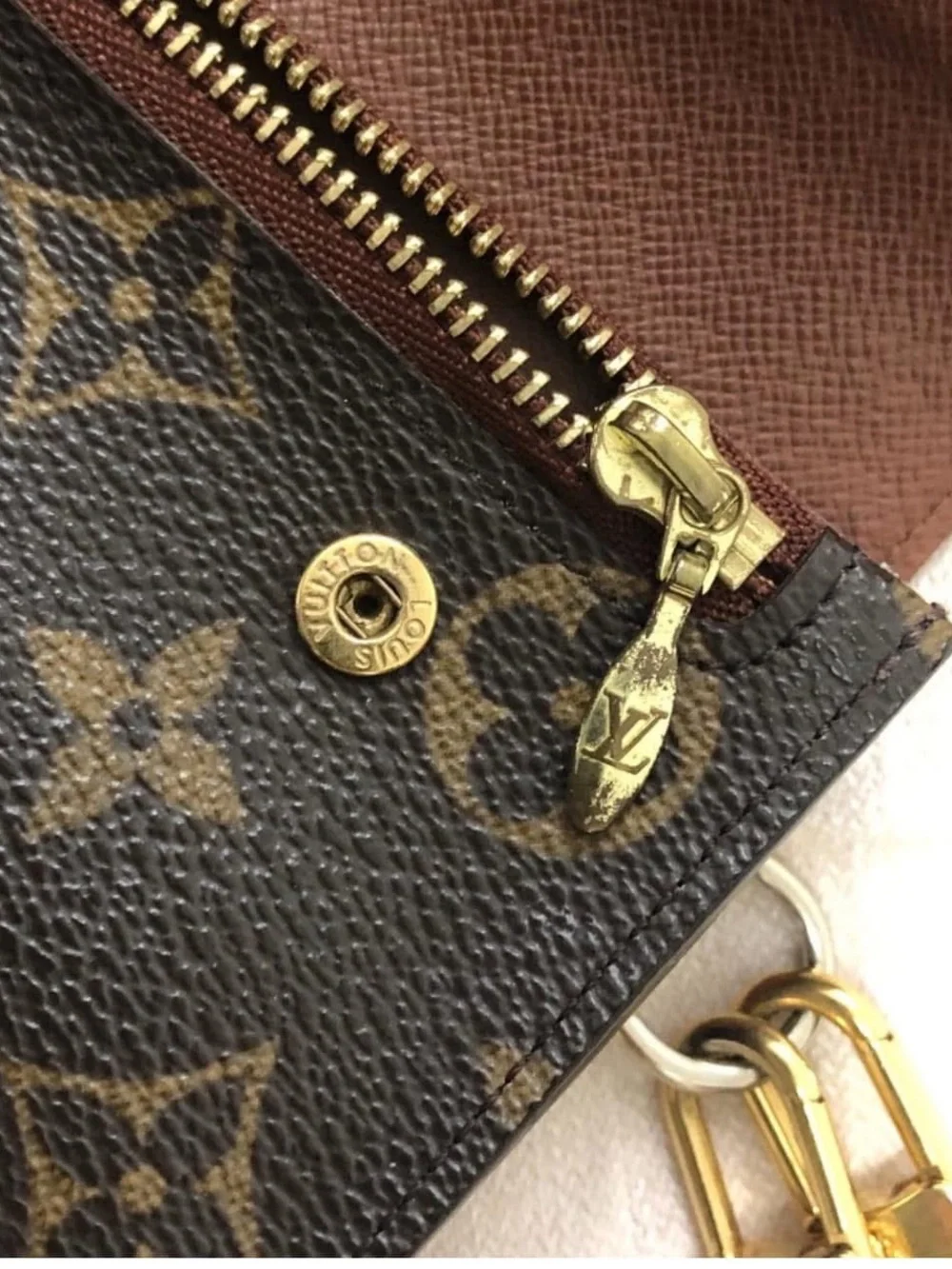 Louis Vuitton Monogram Canvas Accordion Clutch in Brown with Gold Accents